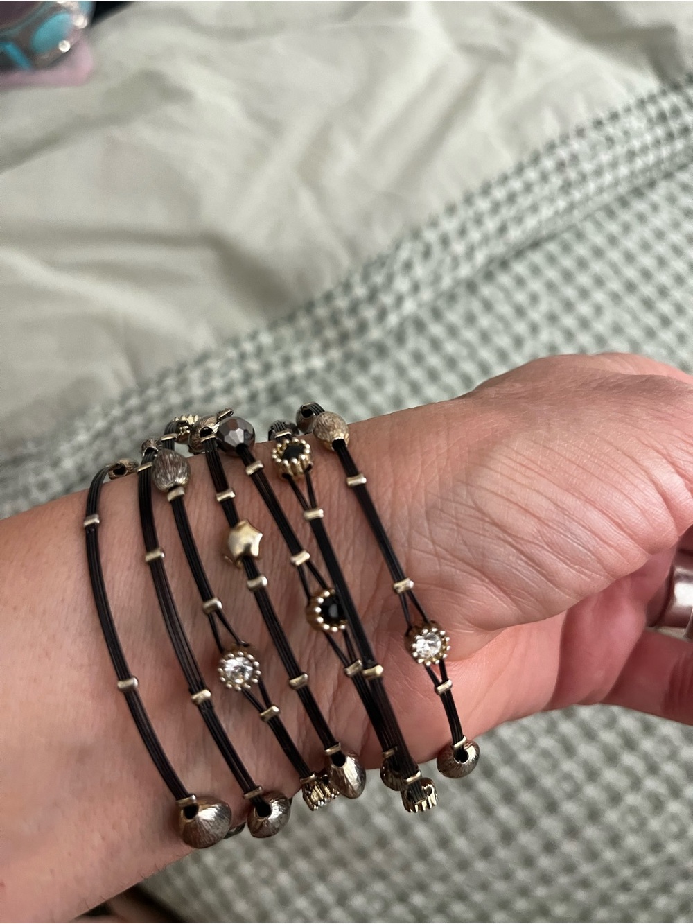 Multi-Strand Black Cord Bracelet with Gold Accents